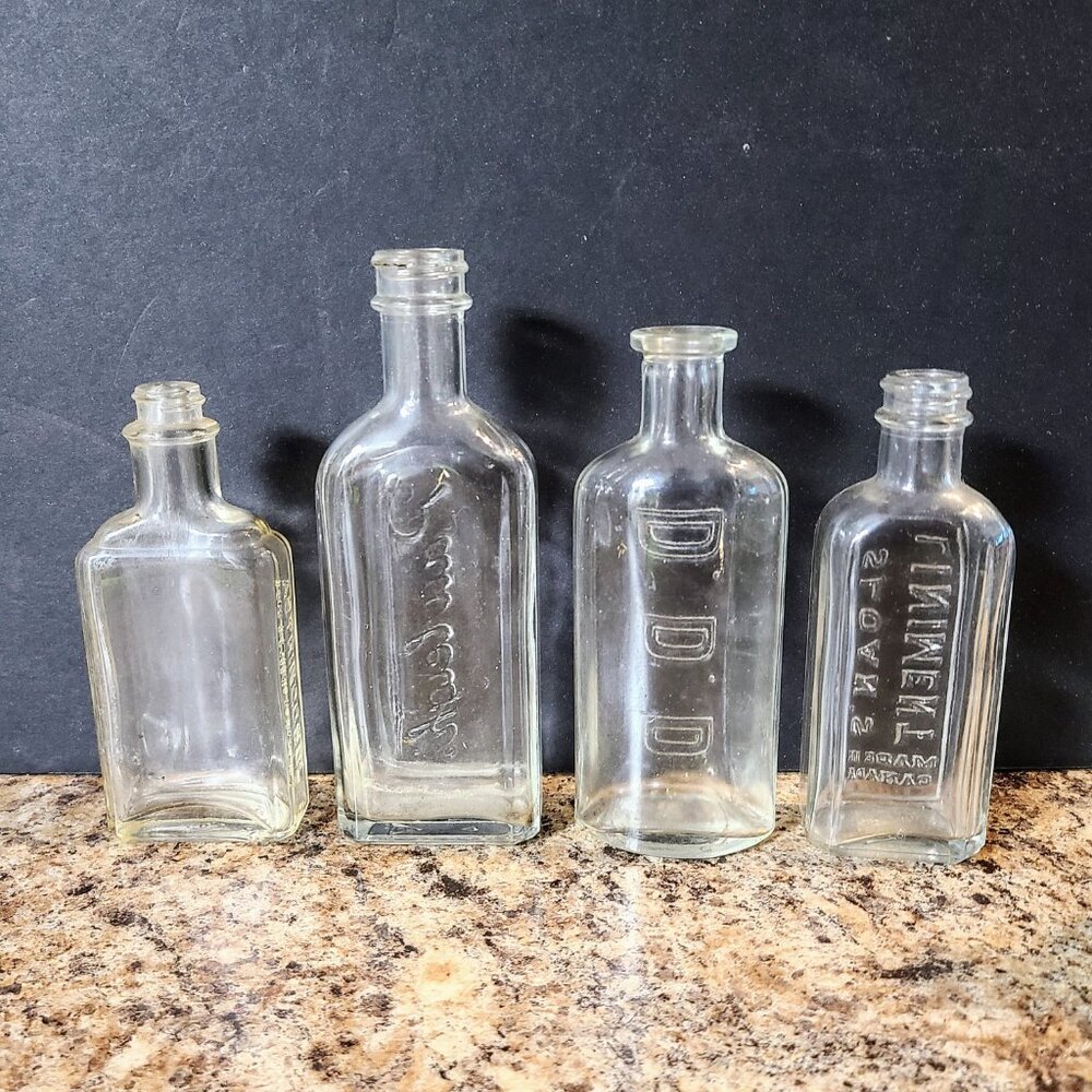 Set Of 4 Antique Glass Medicine Bottles, Sloans, Rawleighs, Astringosol, D.D.D.